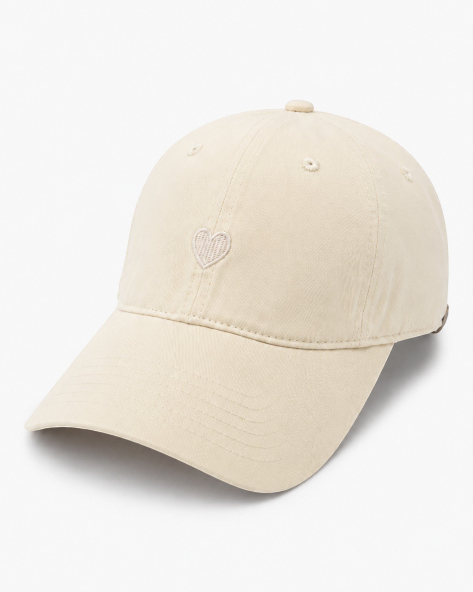 Cap aus Baumwolle mit Herz-Motiv creme
