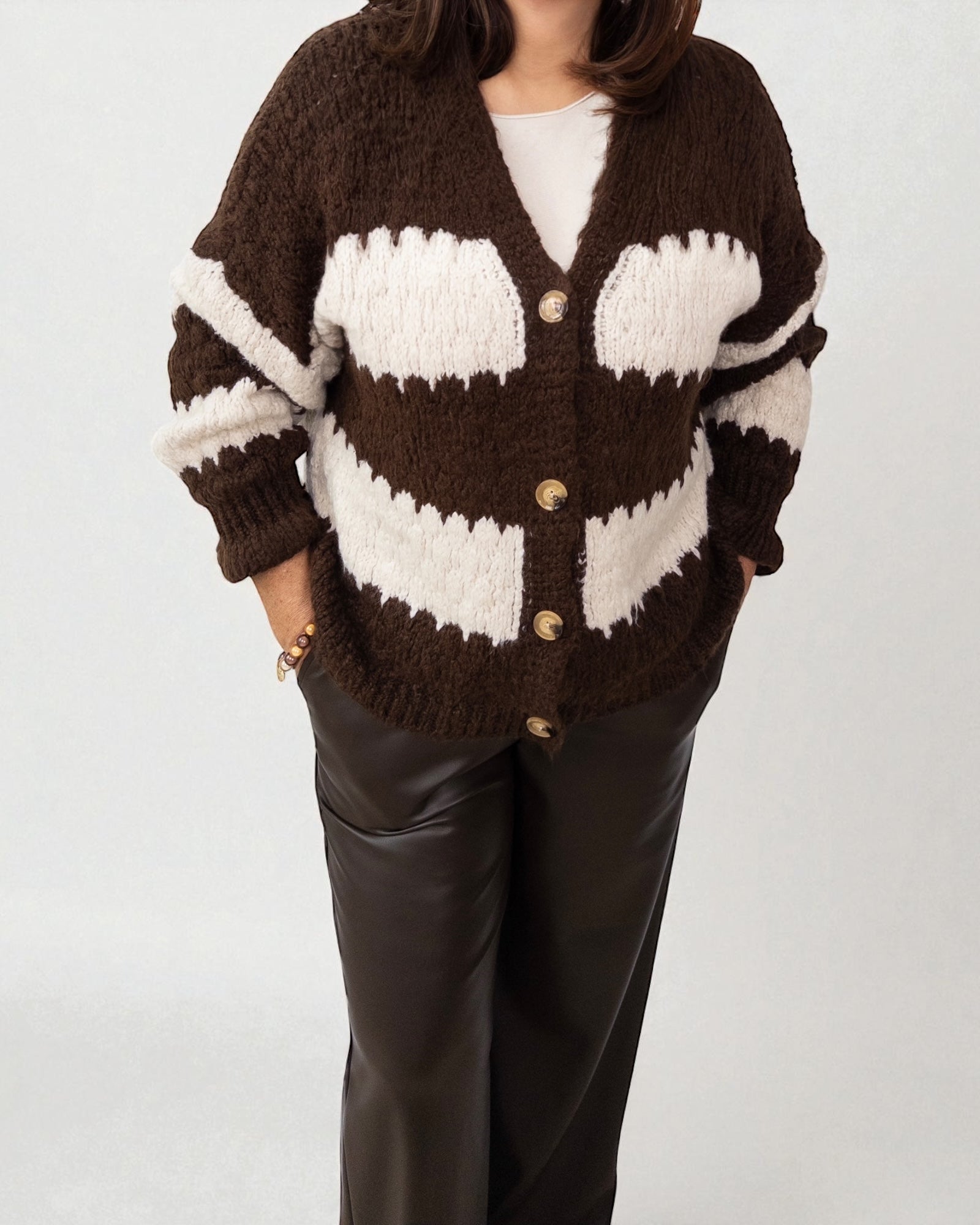 Strickjacke mit Streifen creme schwarz
