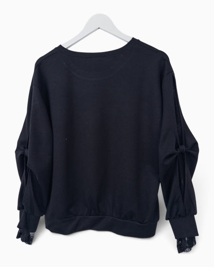 Pullover mit Spitze am Ärmel schwarz